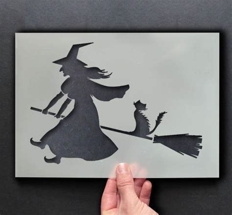 Flying witch on broomstick stencil